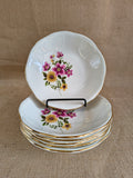 Lot de 6 assiettes en porcelaine de Gien décor fleurs rose et jaune