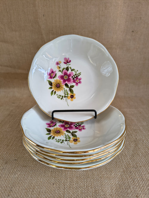 Lot de 6 assiettes en porcelaine de Gien décor fleurs rose et jaune