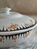 Legumier Art Déco fleurs stylisées orange et noir détail