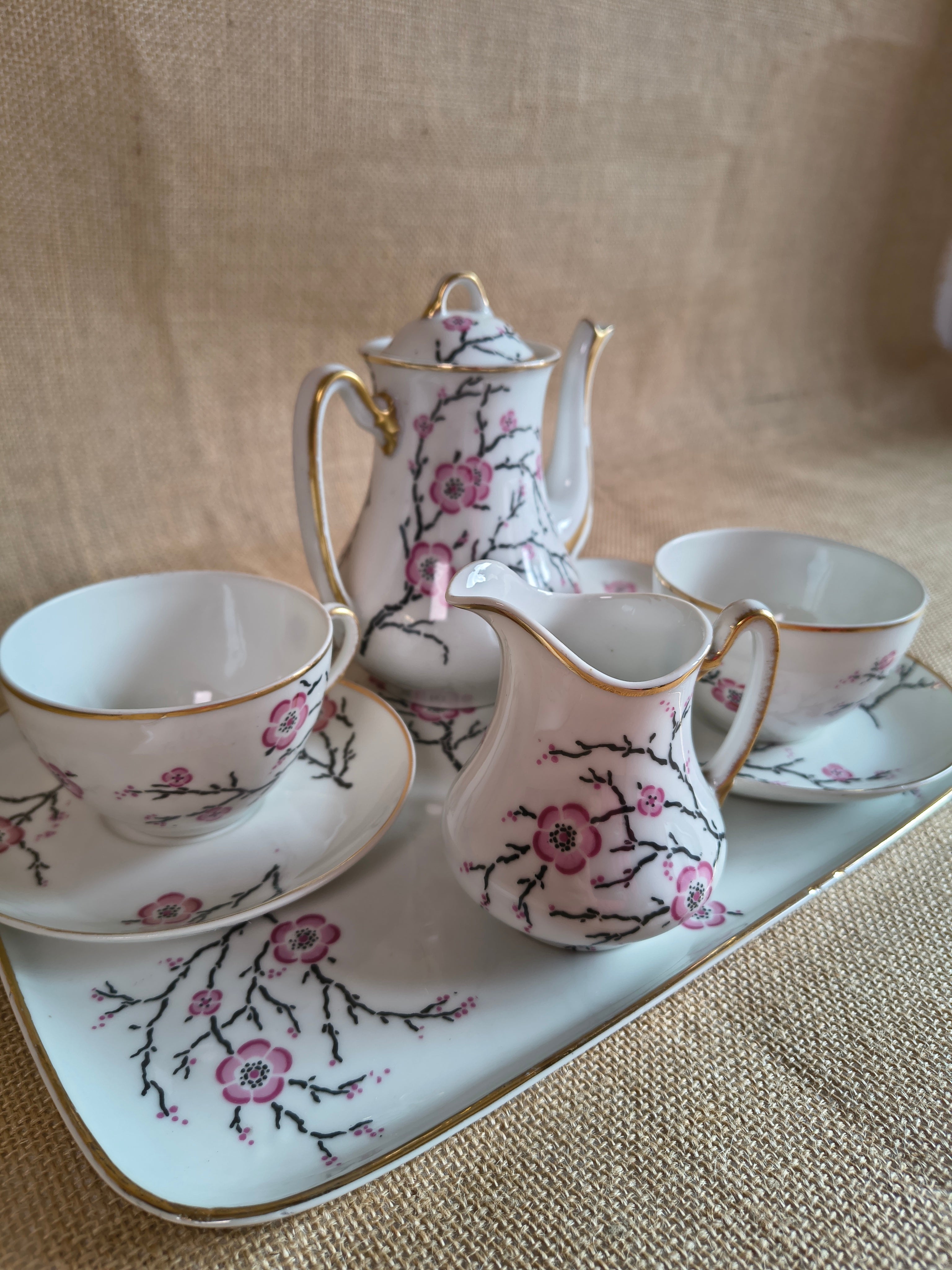 Service à thé tête à tête en porcelaine de Limoges décor fleurs de sakura