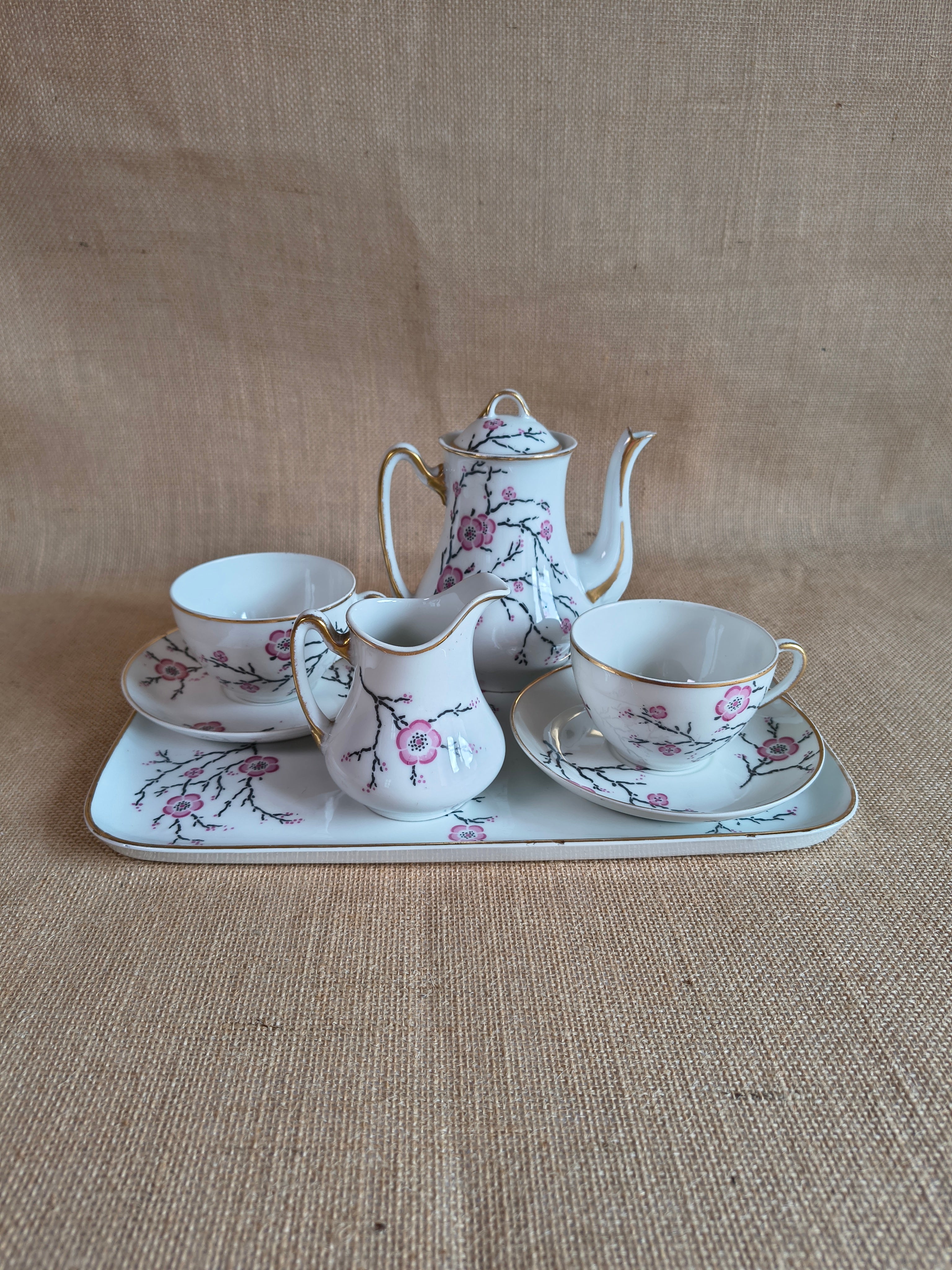 Service à thé tête à tête en porcelaine de Limoges décor fleurs de sakura